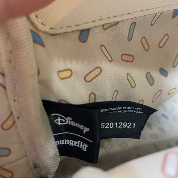 Loungefly Disney mini backpack. Donuts!! Used. Slight stains in lining. See pic - Picture 9 of 11